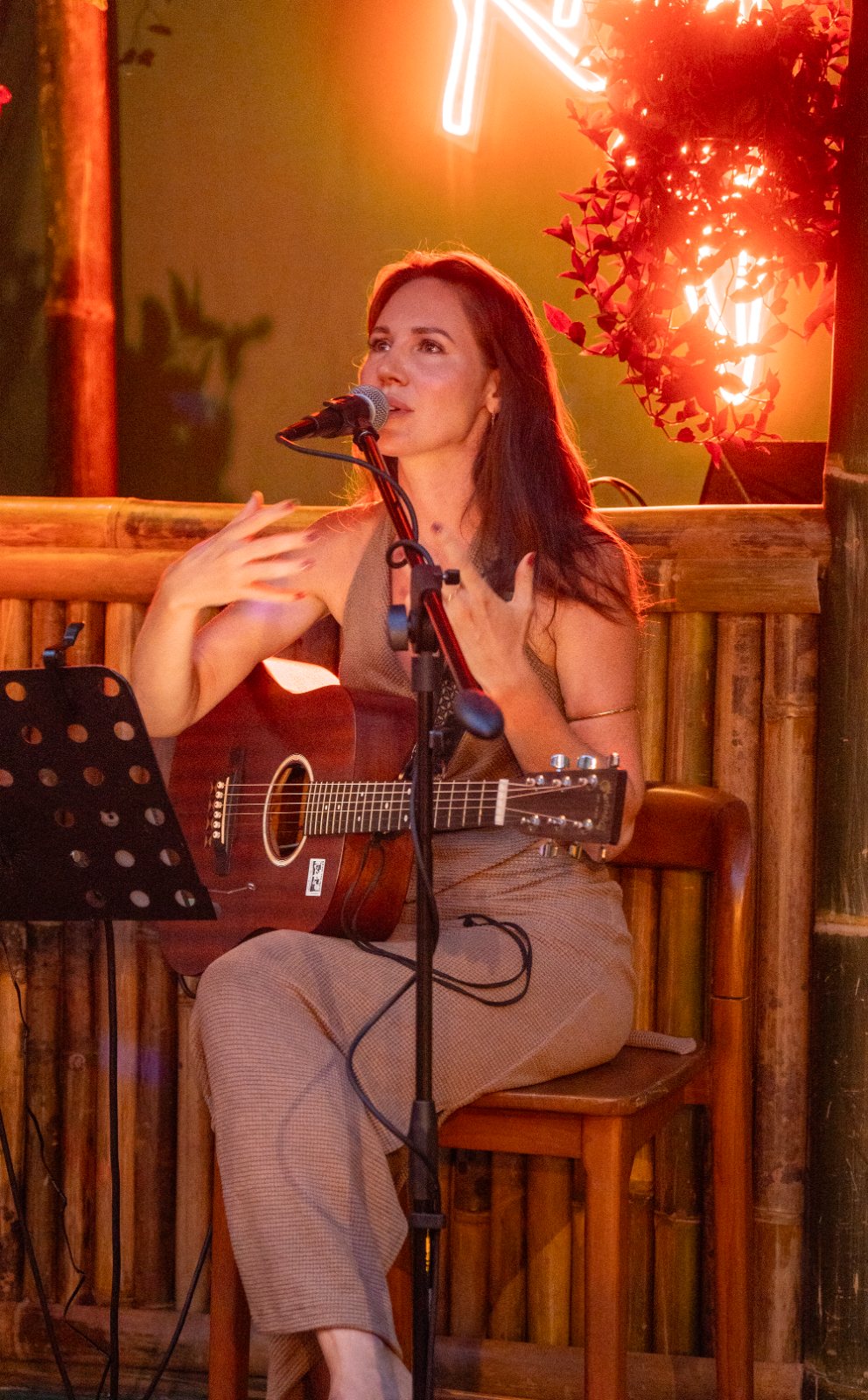 Lana Ra playing guitar